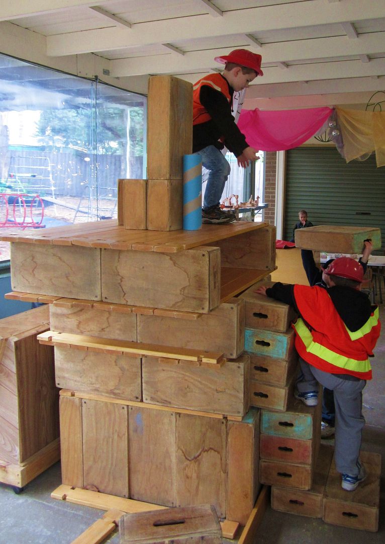 Children Building Huge Block Tower Children Building Huge Block Tower