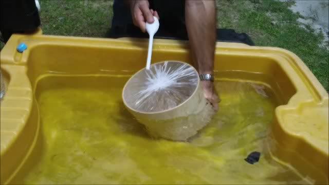 Floating a drum in water to change the pitch Floating a drum in water to change the pitch